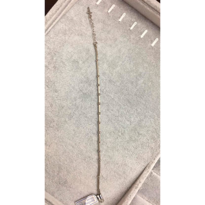 BRACCIALE DECINA MODERNO RIGIDO IN ARGENTO PUNTINATO FINE CON CROCE