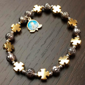 BRACCIALETTO ELASTICON CON MADONNA DELLE ROSE CROCETTE E GRANI A ROSELLINE